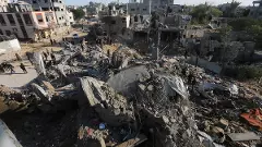 Palestinians look at the destruction by the Israeli bombardment of the Gaza Strip in Rafah | AP/PTI