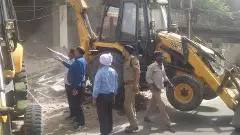 Maharashtra: Civic body razes illegal shops in Thane after communal clash