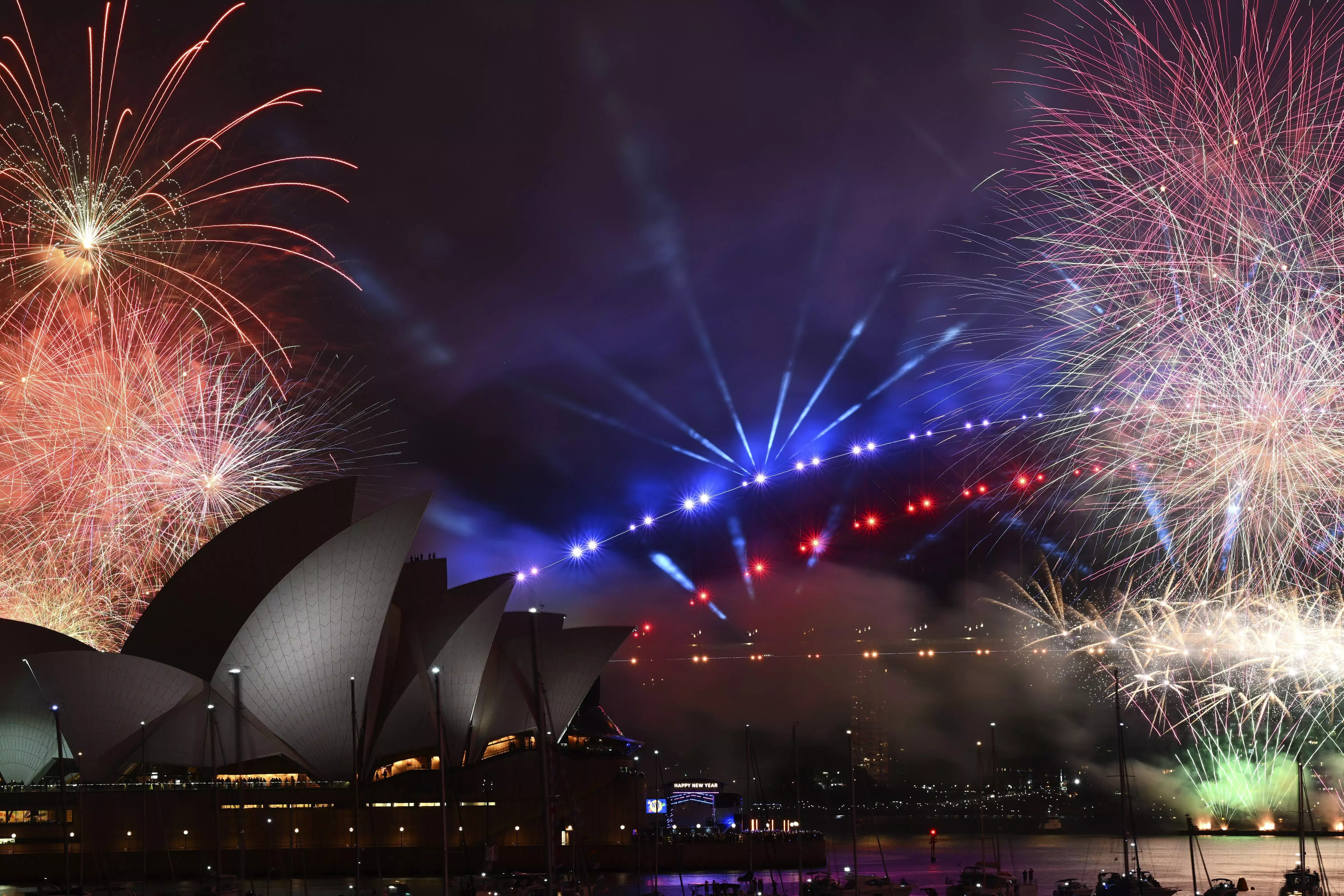 New Year celebrations roll across Asia, but wars cast a shadow on 2024