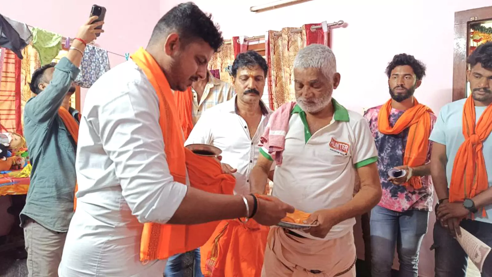 Ahead of the temple consecration on January 22, Ram Mantrakshate — sacred rice mixed with turmeric powder offered to gods in Hindu rituals — is being distributed among people in coastal Karnataka.