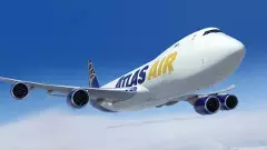 Flames shoot out of US Boeing cargo plane after engine on left wing catches fire