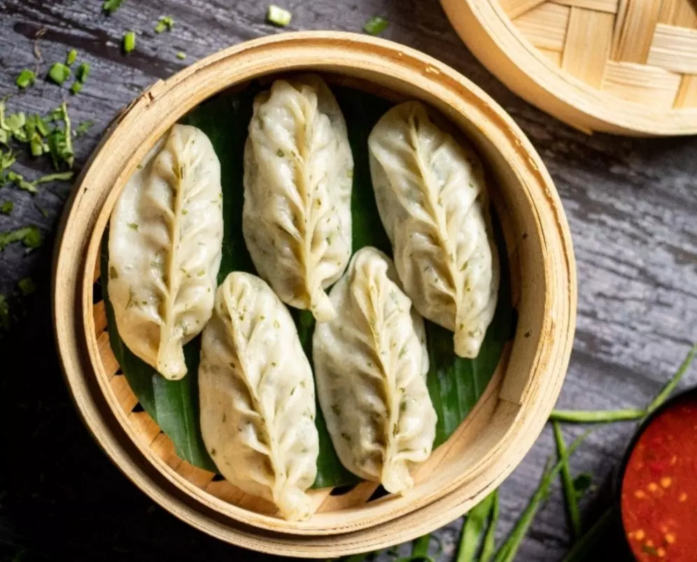 Woman dies, 40 hospitalised after eating momos in Hyderabad, 6 arrested