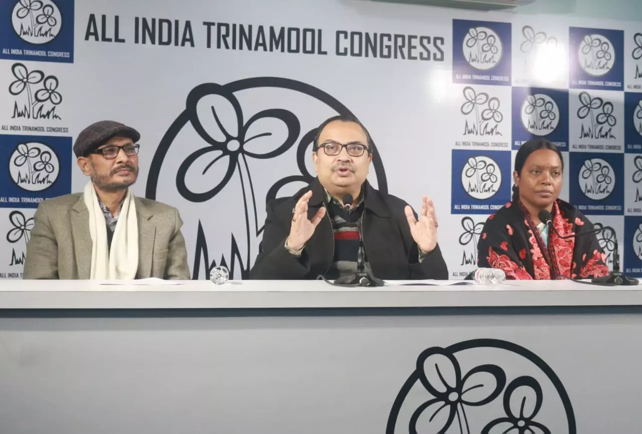 TMC spokesperson Kunal Ghosh (centre) with West Bengal minister Birbaha Hansda (right) and Dhupaguri MLA Nirmal Chandra Roy