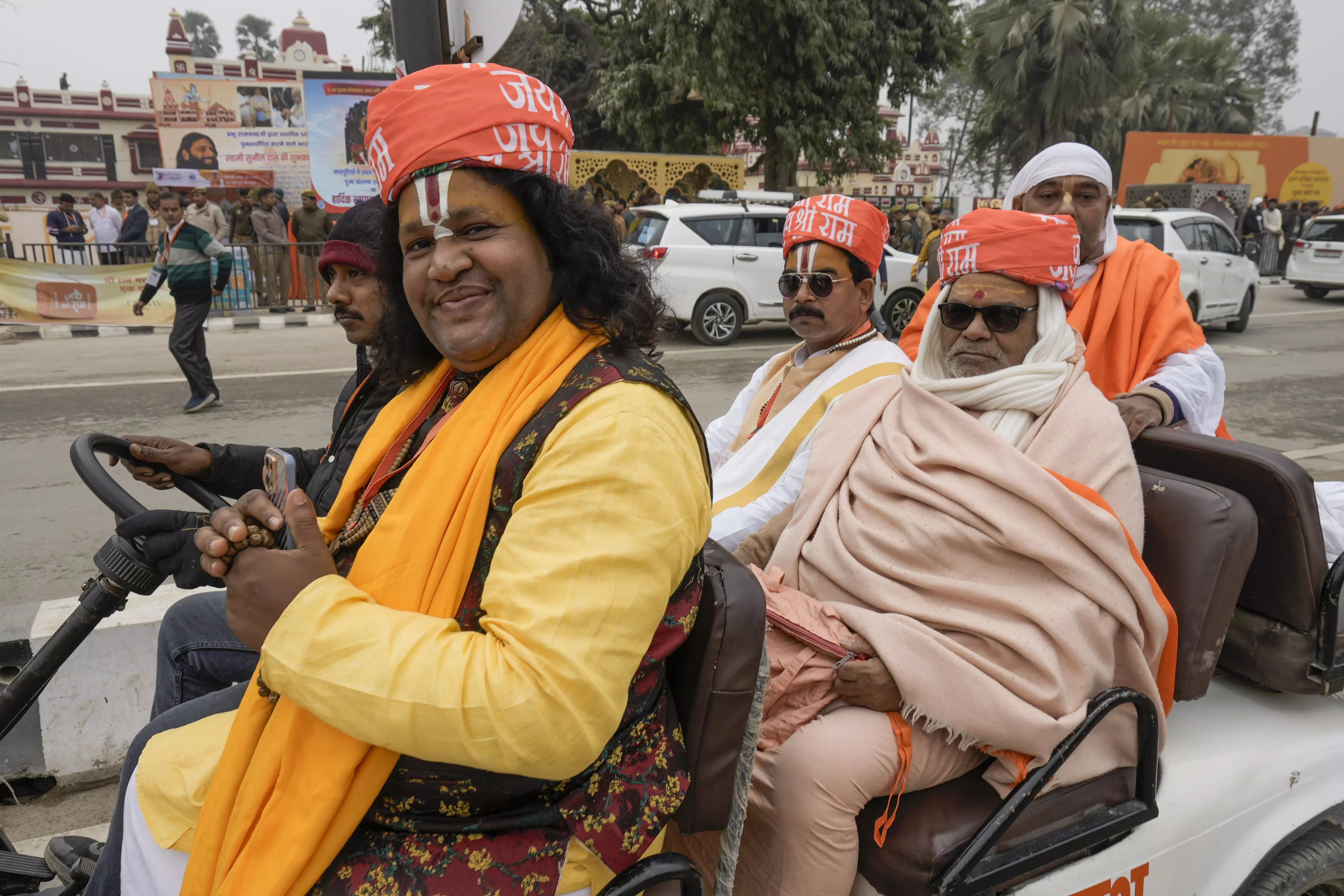 Devotees arrive for the Ram Mandir Pran Pratishtha ceremony. Photo: PTI