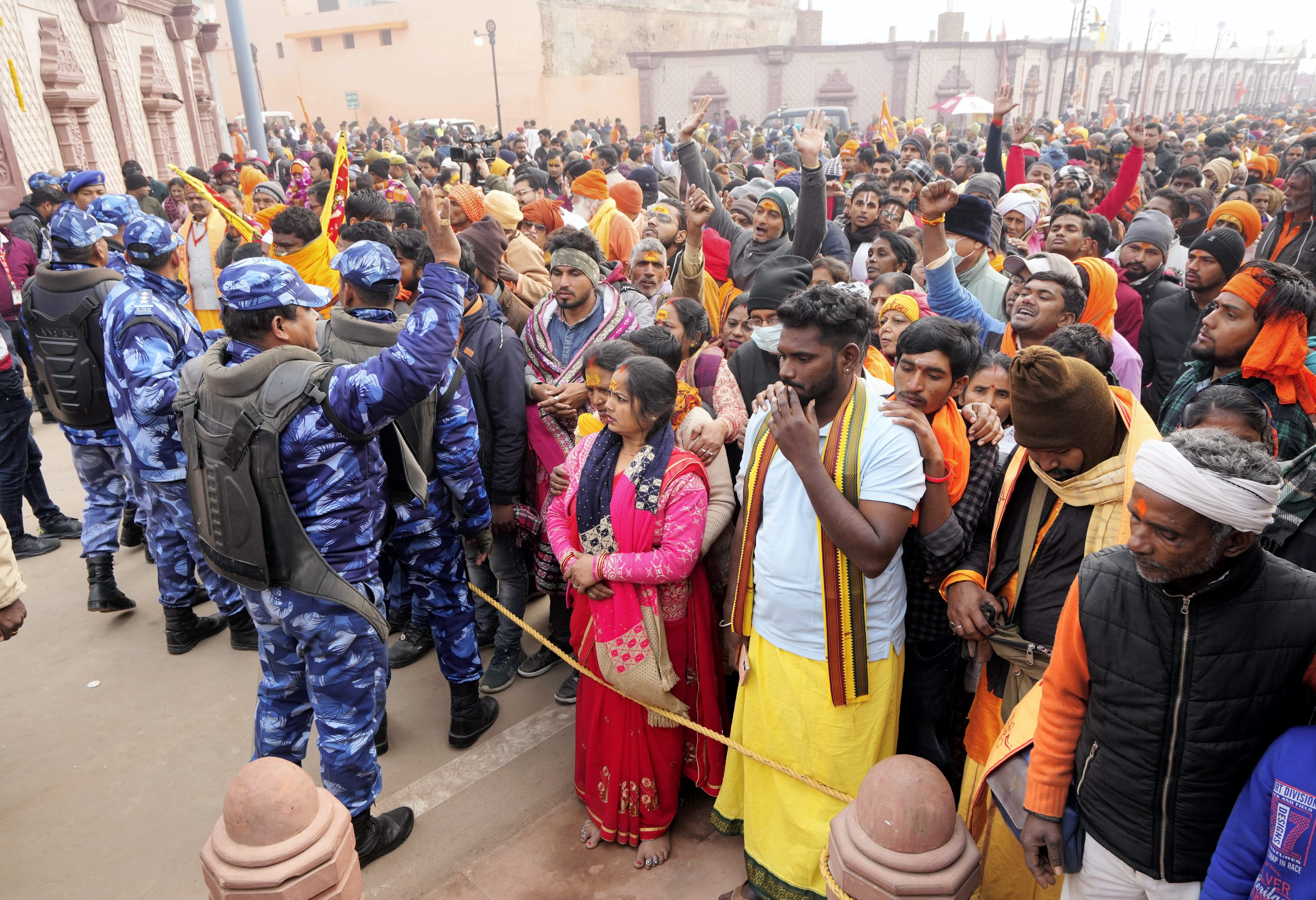 Devotees throng Ayodhya Ram temple on first day, security force ...