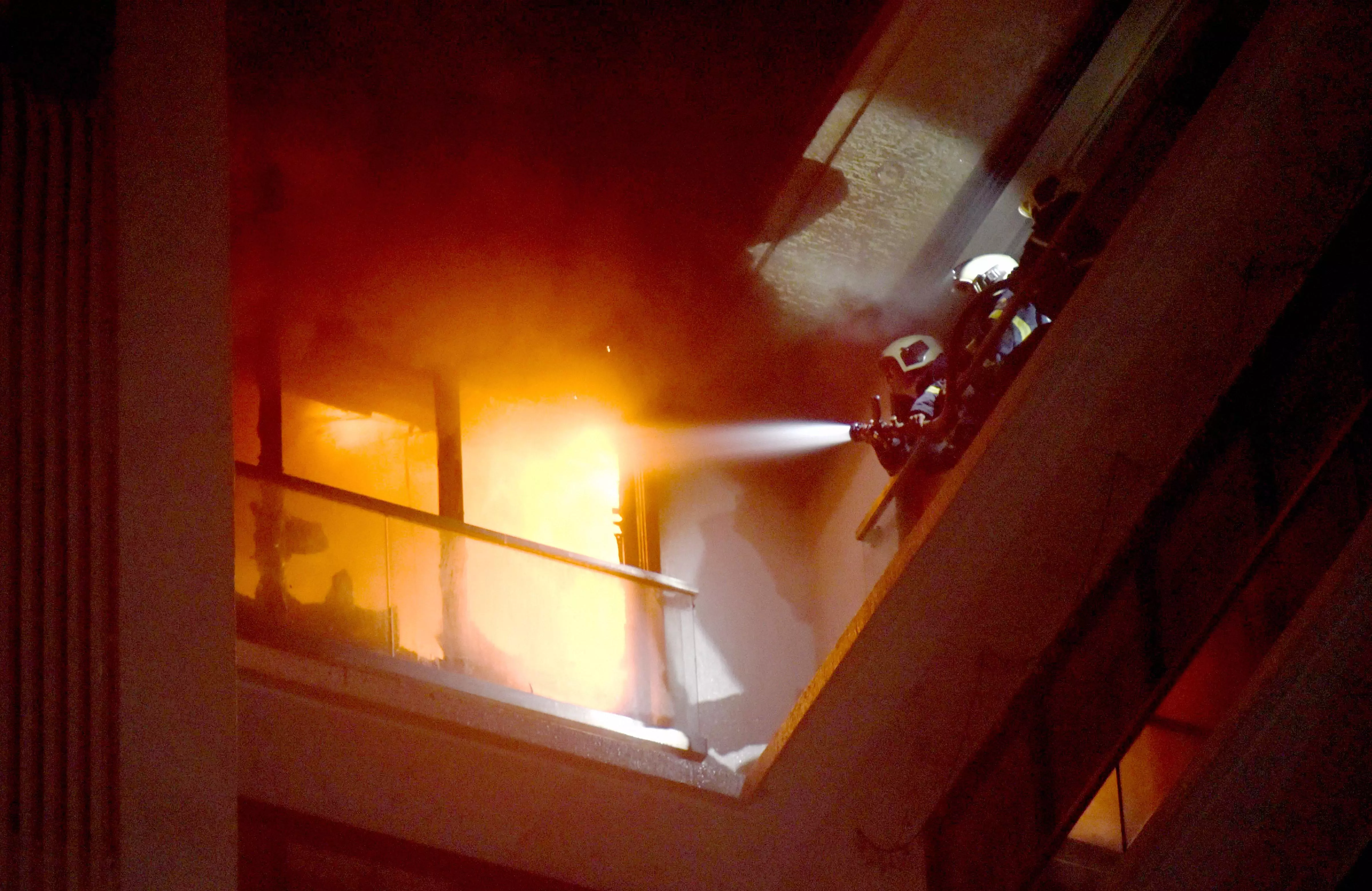 residential building fire, mumbai, Vile Parle, fire fighters, rescued