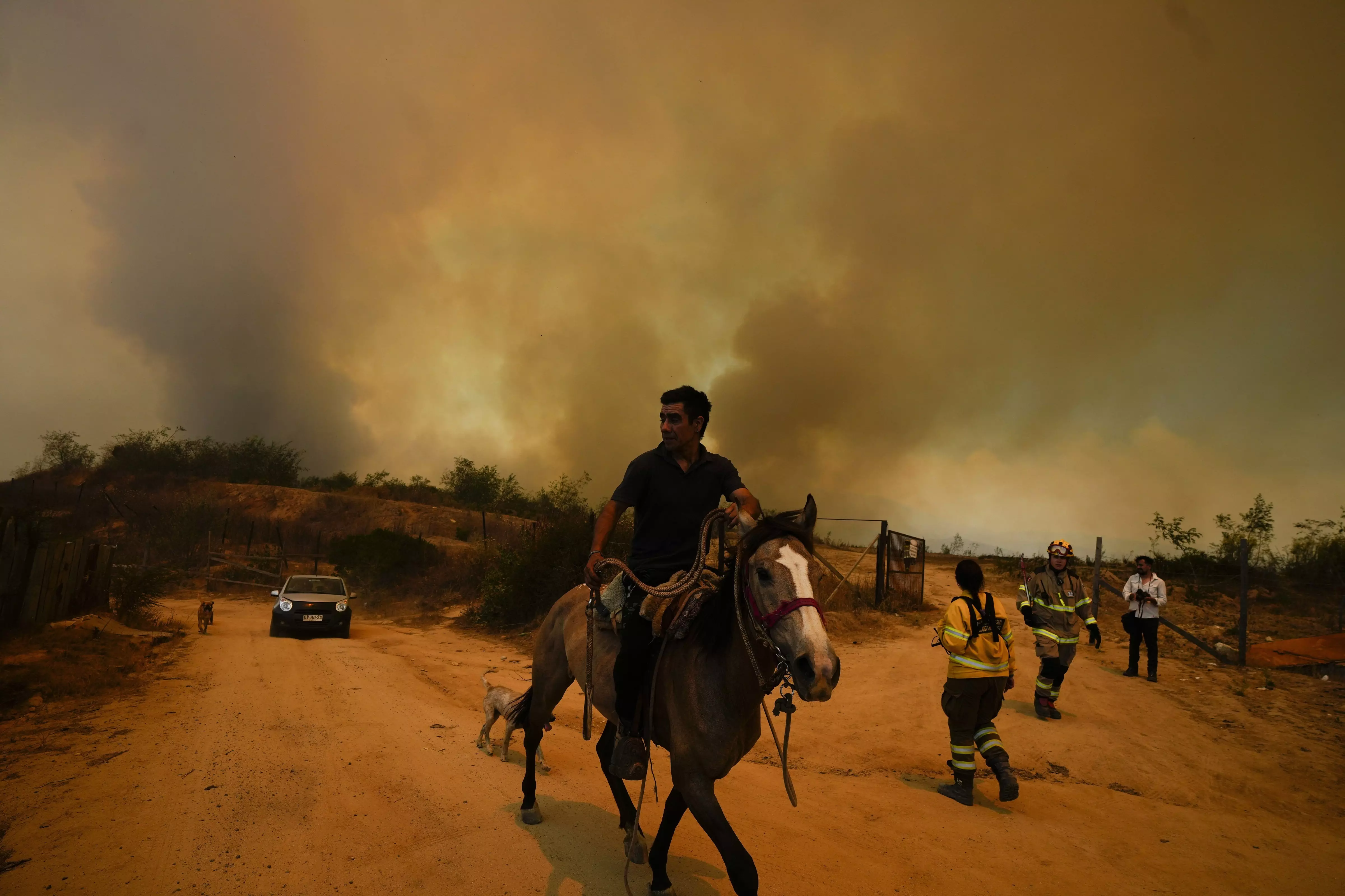 Forest fires rage on in central Chile, killing at least 112 people over 3 days