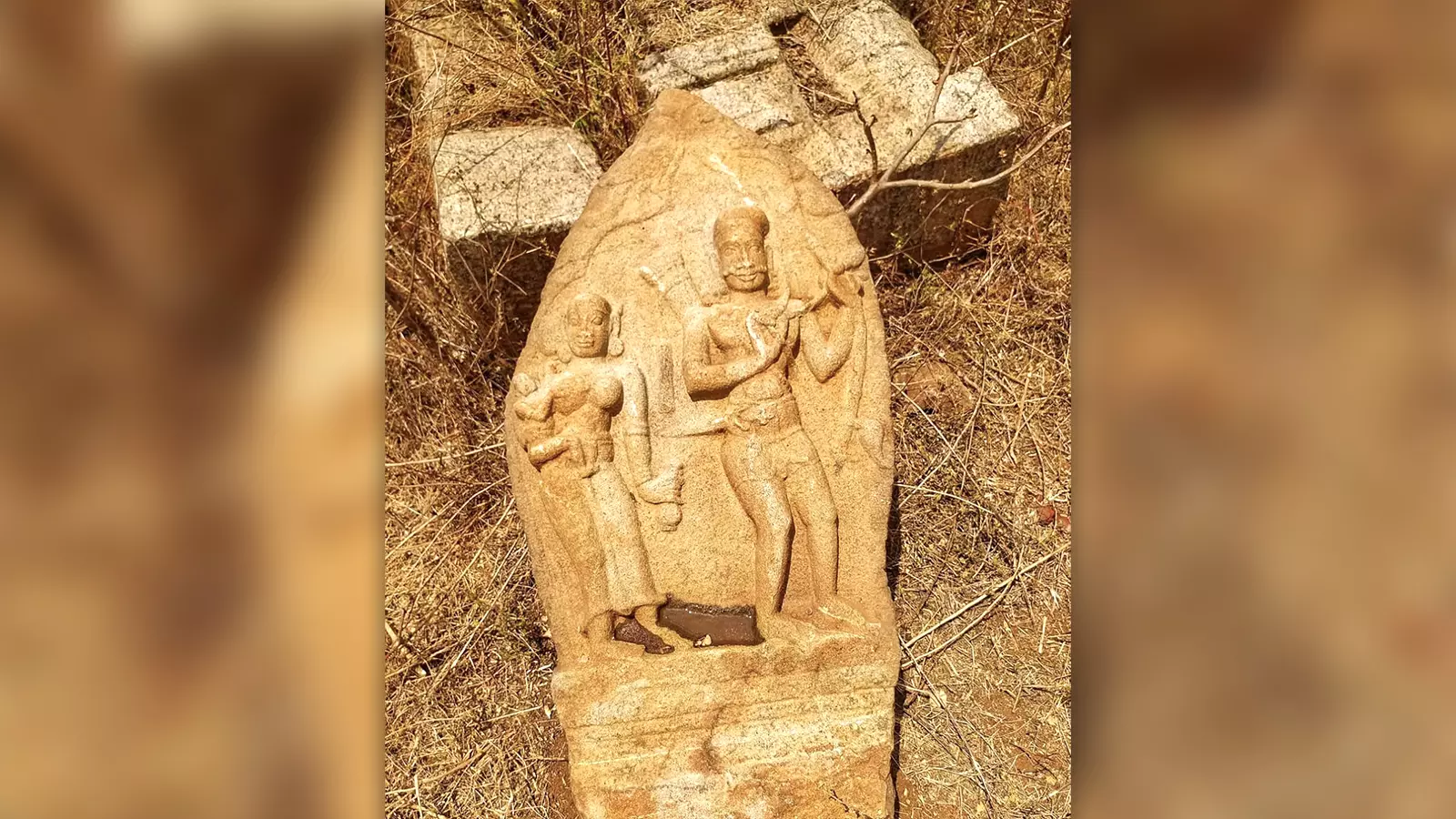 A woman, carrying a child, along with her partner. The stone structure was documented by sculpture expert Devi in Maravappati in Madurai.  