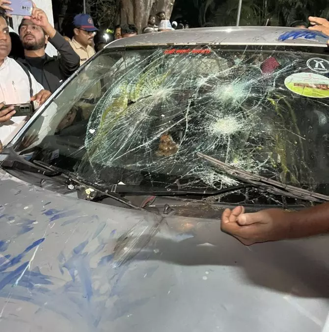 Television visuals showed BJP workers mobbing the car at Khandoji Baba Chowk and vandalising it, resulting in the vehicle.