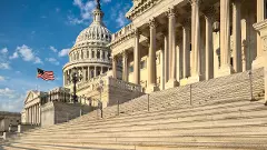Detail view of the US Capitol east facade in the early morning sun.