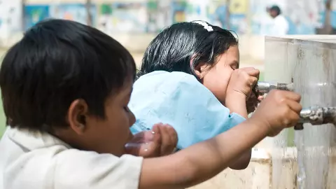 School children drinking water
