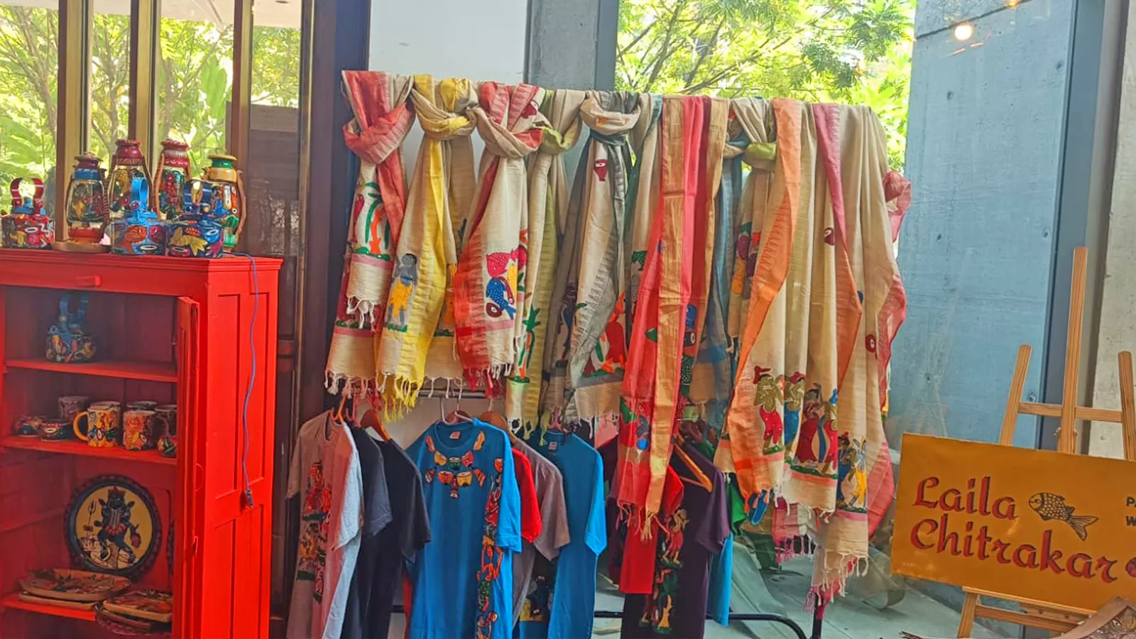Scarves, tee-shirts and decorative items designed in motifs of Patachitra paintings.