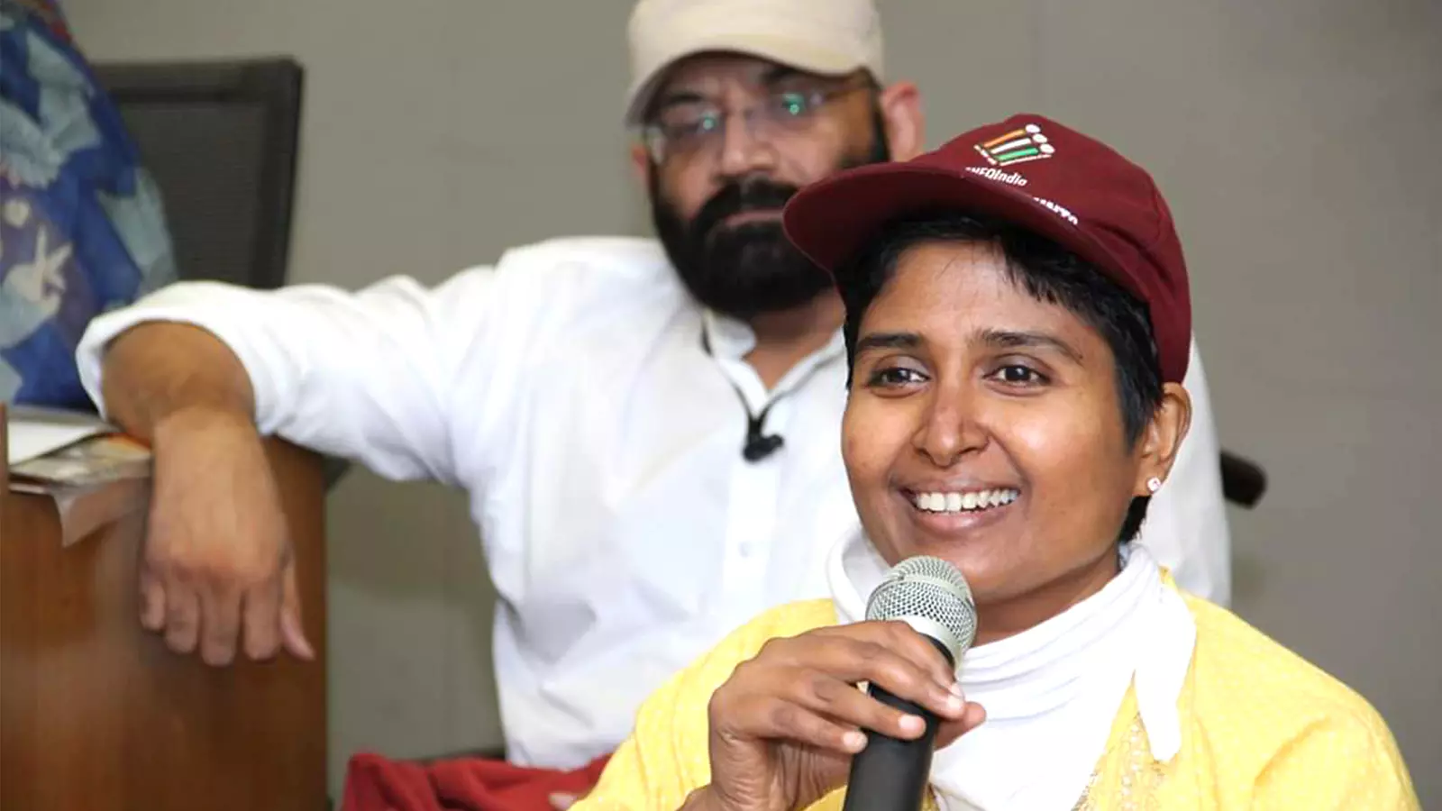 Disabled rights activist Smitha Sadasivan speaking at an event.