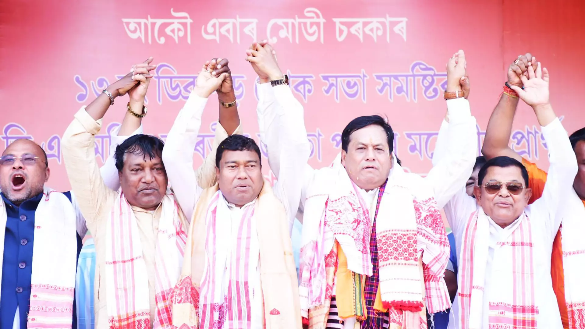 BJP candidate Sarbananda Sonowal with party leaders, including Rameswar Teli, in a rally at Mancotta tea estate in Dibrugarh.