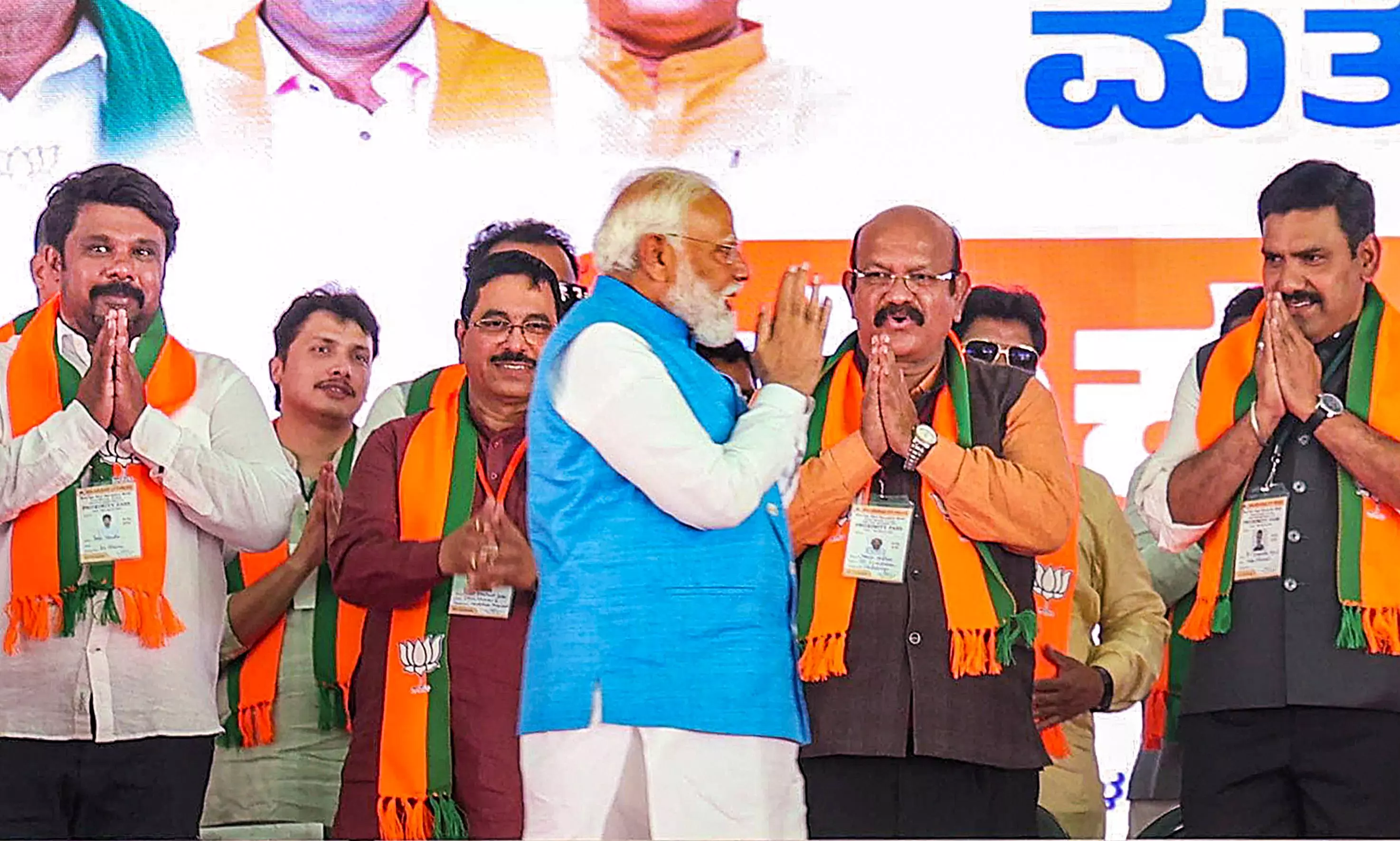 Prime Minister Narendra Modi being greeted by BJP leaders during a public meeting ahead of Lok Sabha elections, in Kalaburagi, Karnataka on Saturday | PTI