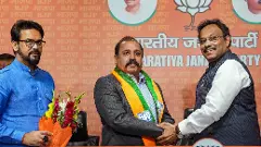 Air Chief Marshal (Retd.) RKS Bhadauria joins BJP in the presence of Anurag Thakur and Vinod Tawde. PTI