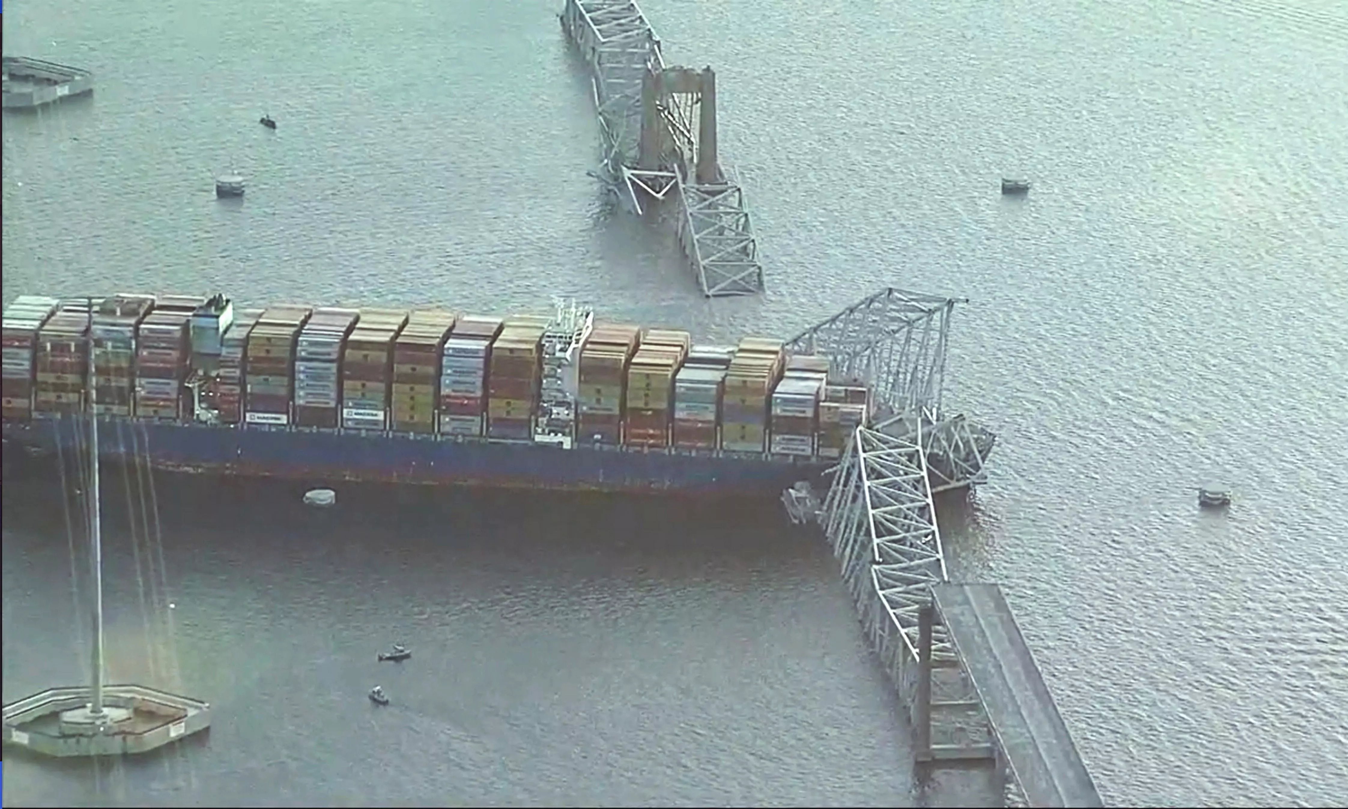 Baltimore bridge collapse: Cranes en route to site to begin removing wreckage