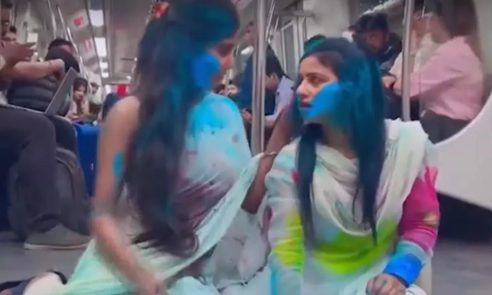 Probe video of two women playing Holi on metro train: DMRC tells police