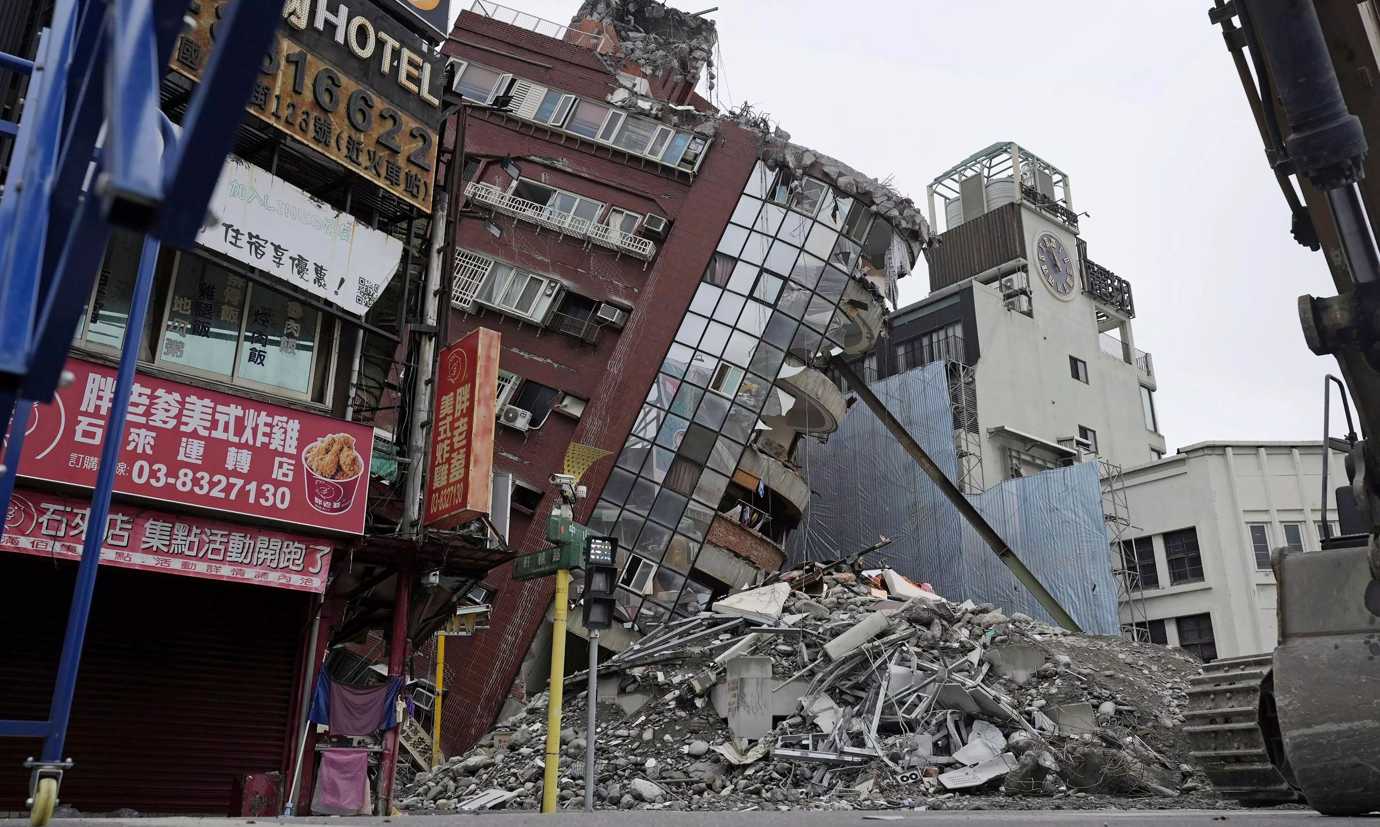 Aftershocks pause leaning building demolition in Taiwan; death toll climbs to 13
