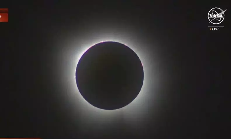 North America watches in awe as total solar eclipse envelops sky