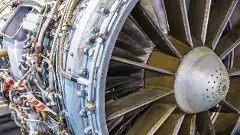 Creative abstract aviation industry technology concept: macro view of the airliner turbojet turbine engine equipment with selective focus effect