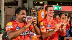 Muttiah Muralitharan, Simon Helmot