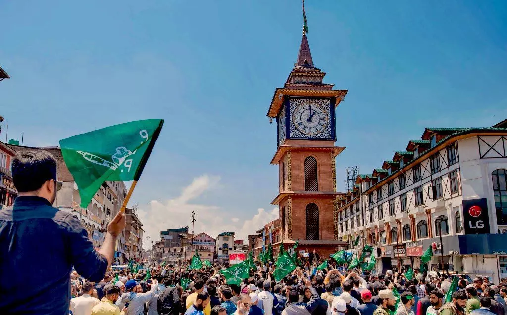 PDP’s Waheed Parra reclaimed Srinagars famed Ghanta Ghar (clock tower) with his party’s green flags amid passionate slogans