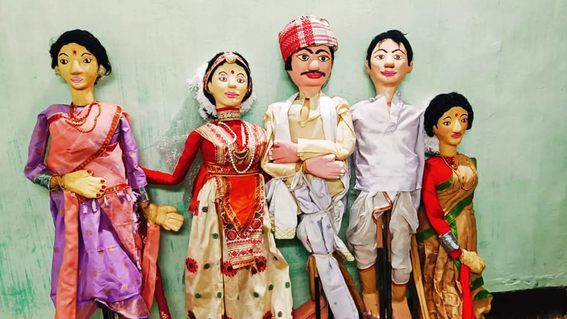 The traditional Assamese puppets in various colours and costumes.