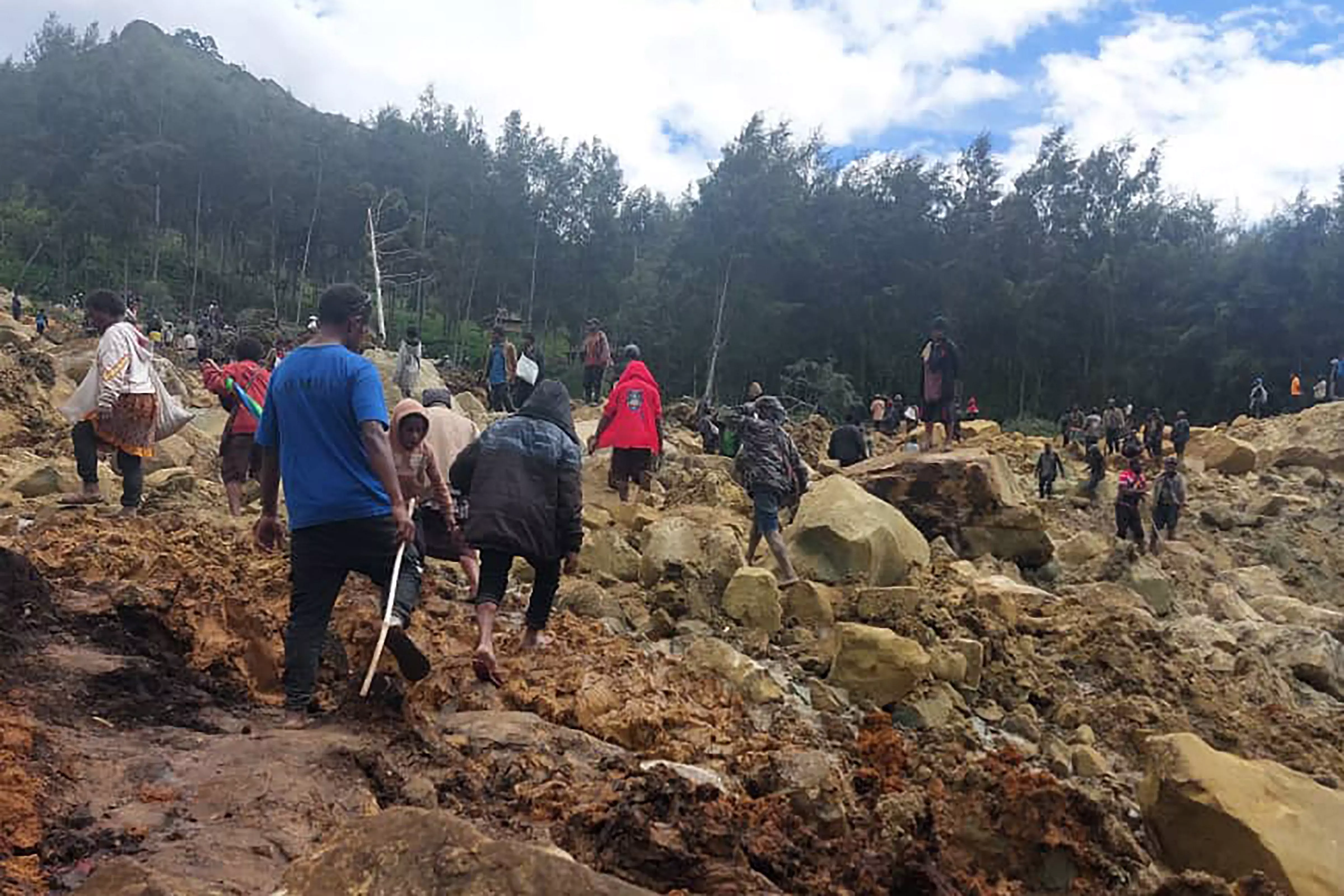 Papua New Guinea says landslide buried 2,000 people, formally seeks help