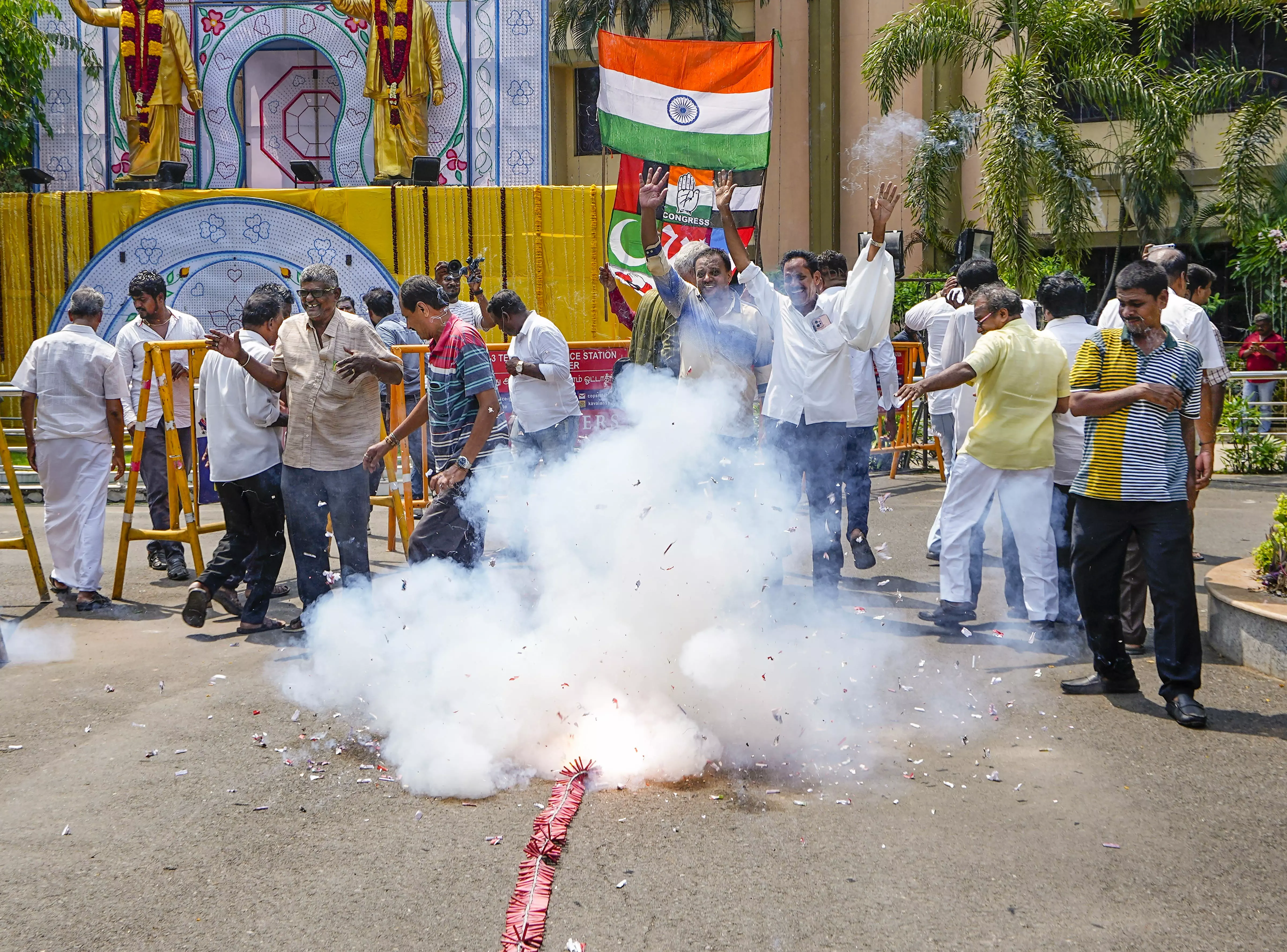 DMK supporters celebrate the partys lead during counting of votes for Lok Sabha elections, at party headquarters, Anna Arivalayam, in Chennai, on Tuesday, June 4. PTI