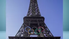 The five Olympic rings displayed on the Eiffel Tower in Paris