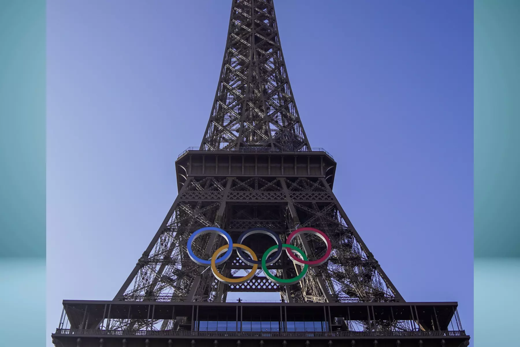 The five Olympic rings displayed on the Eiffel Tower in Paris
