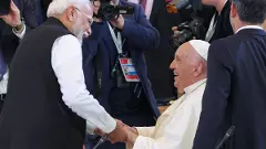 Pope Francis greets Prime Minister Narendra Modi during the G7 Summit at Savelletri Di Fasano in Italy on Friday