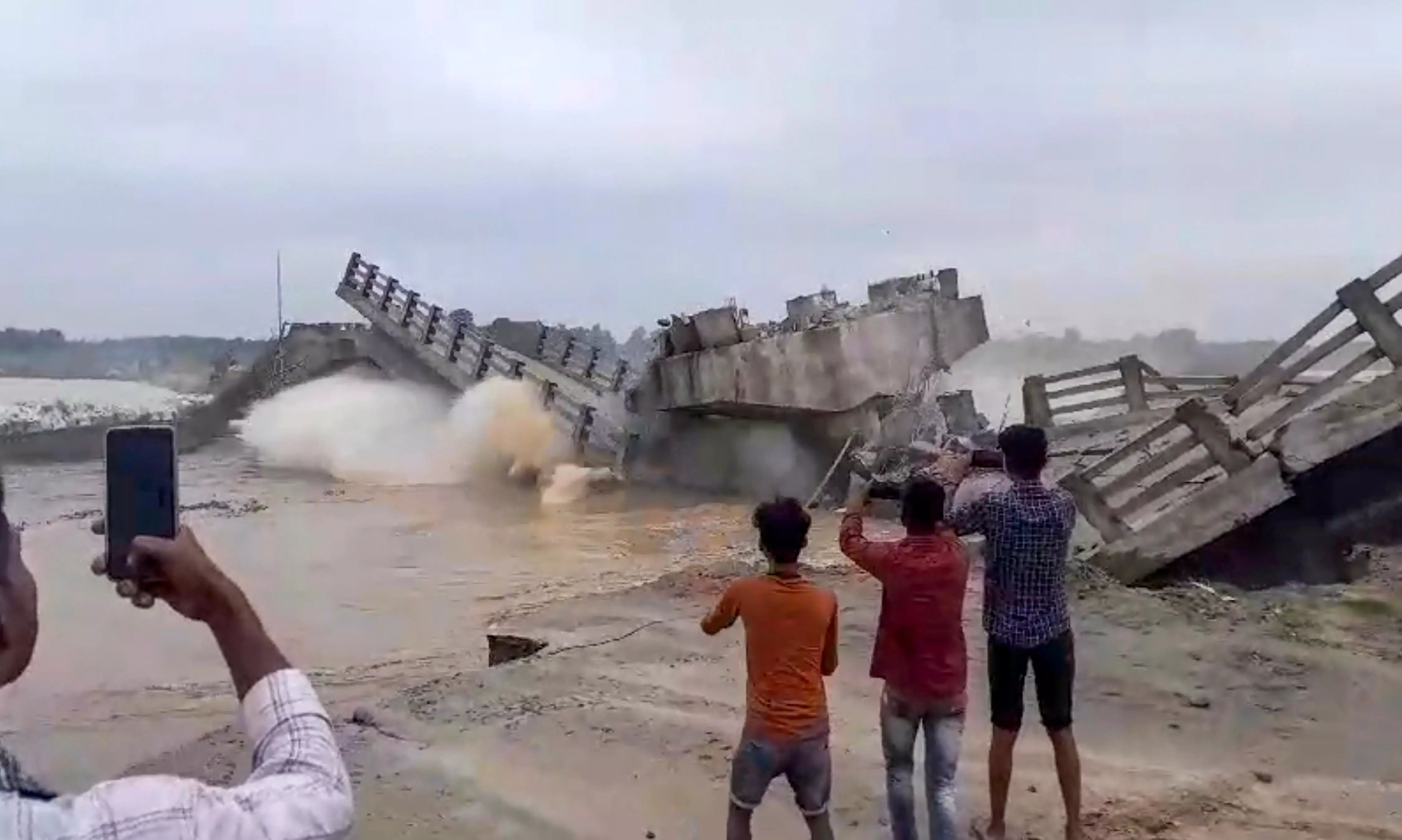 A bridge collapses into the Bakra river at Padkiya Ghat, in the Sikti block area of Araria, Bihar, Tuesday, June 18, 2024.