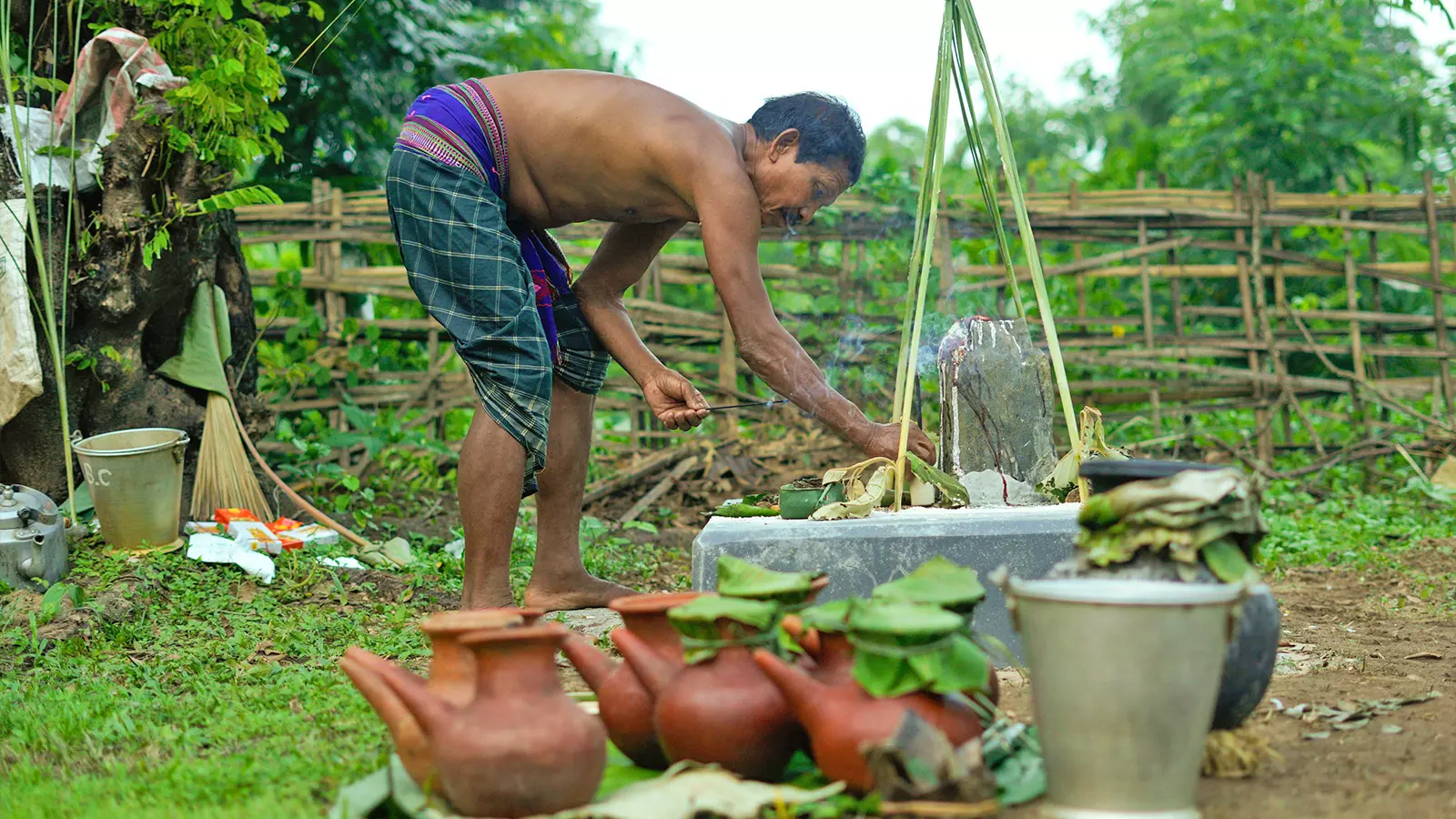 A male Baibra (priest) performs rituals during Baikho festival in Gamerimura village, Kamrup district of Assam. Photos: Surajit Sharma