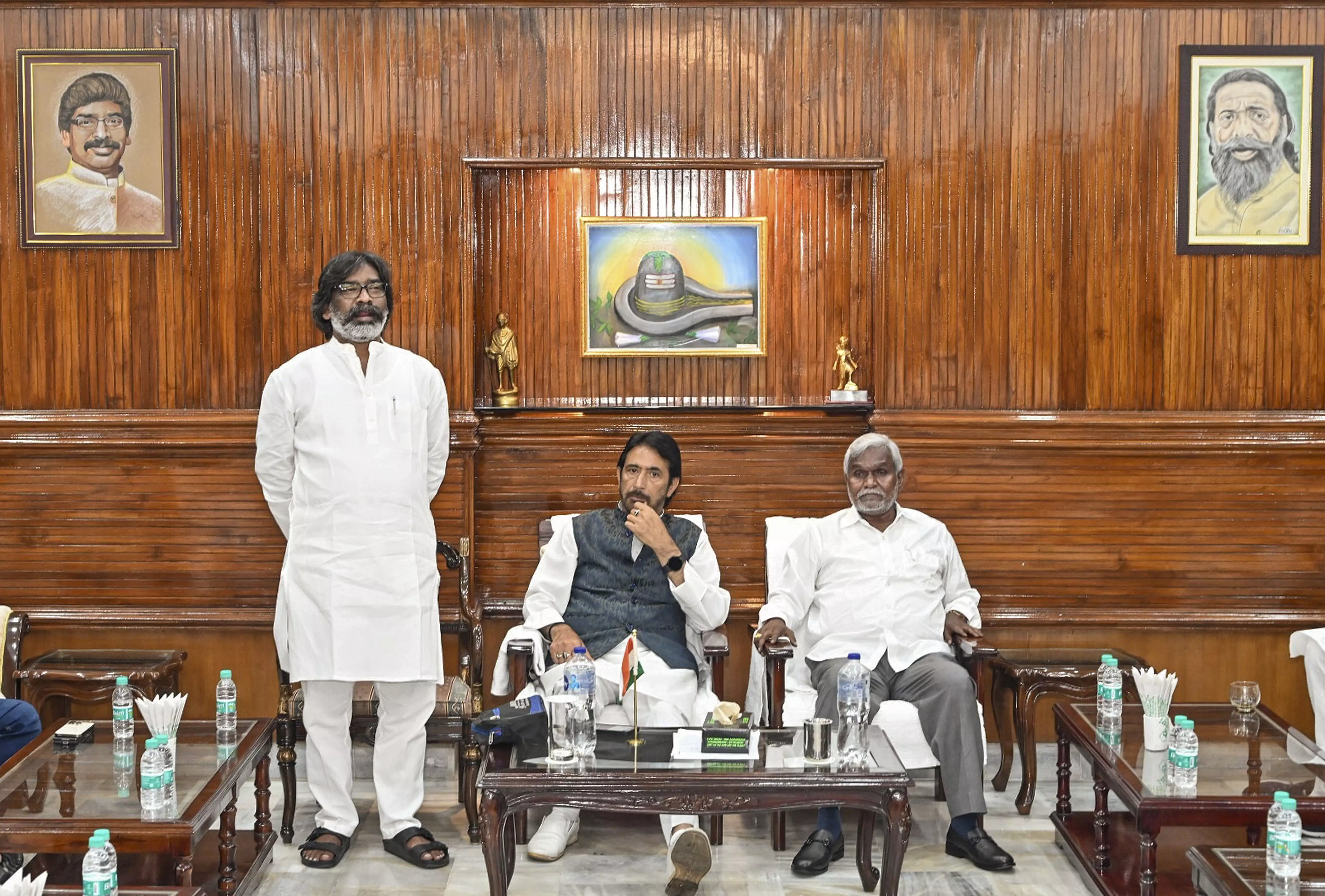 Champai Soren, Hemant Soren, and Jharkhand Congress in-charge Gulam Ahmad Mir (in the middle) during a legislative party meeting in Ranchi on Wednesday. PTI Photo