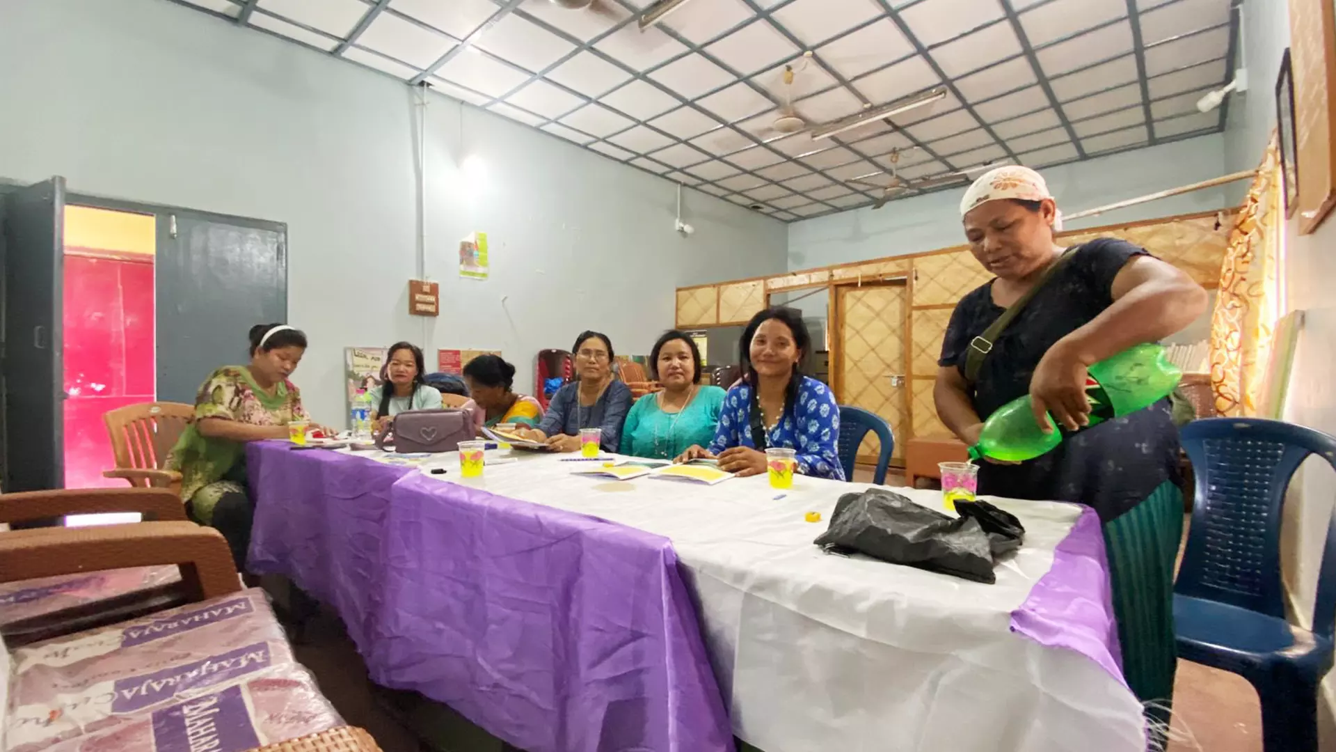 Students enjoying snacks and beverages after a class.