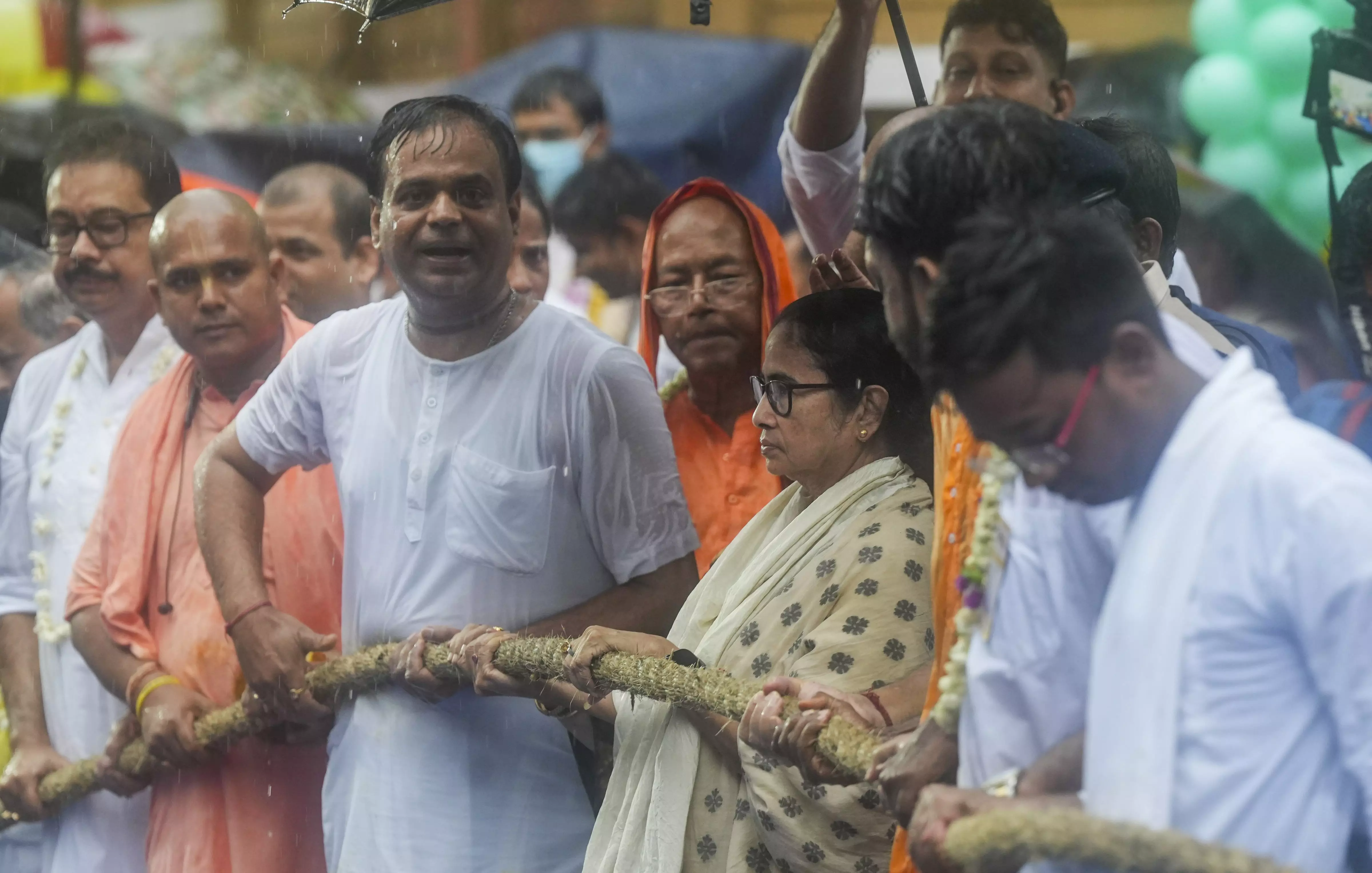 West Bengal Chief Minister Mamata Banerjee pulls the ropes of the chariot during ISKCON Rath Yatra, in Kolkata | PTI 
