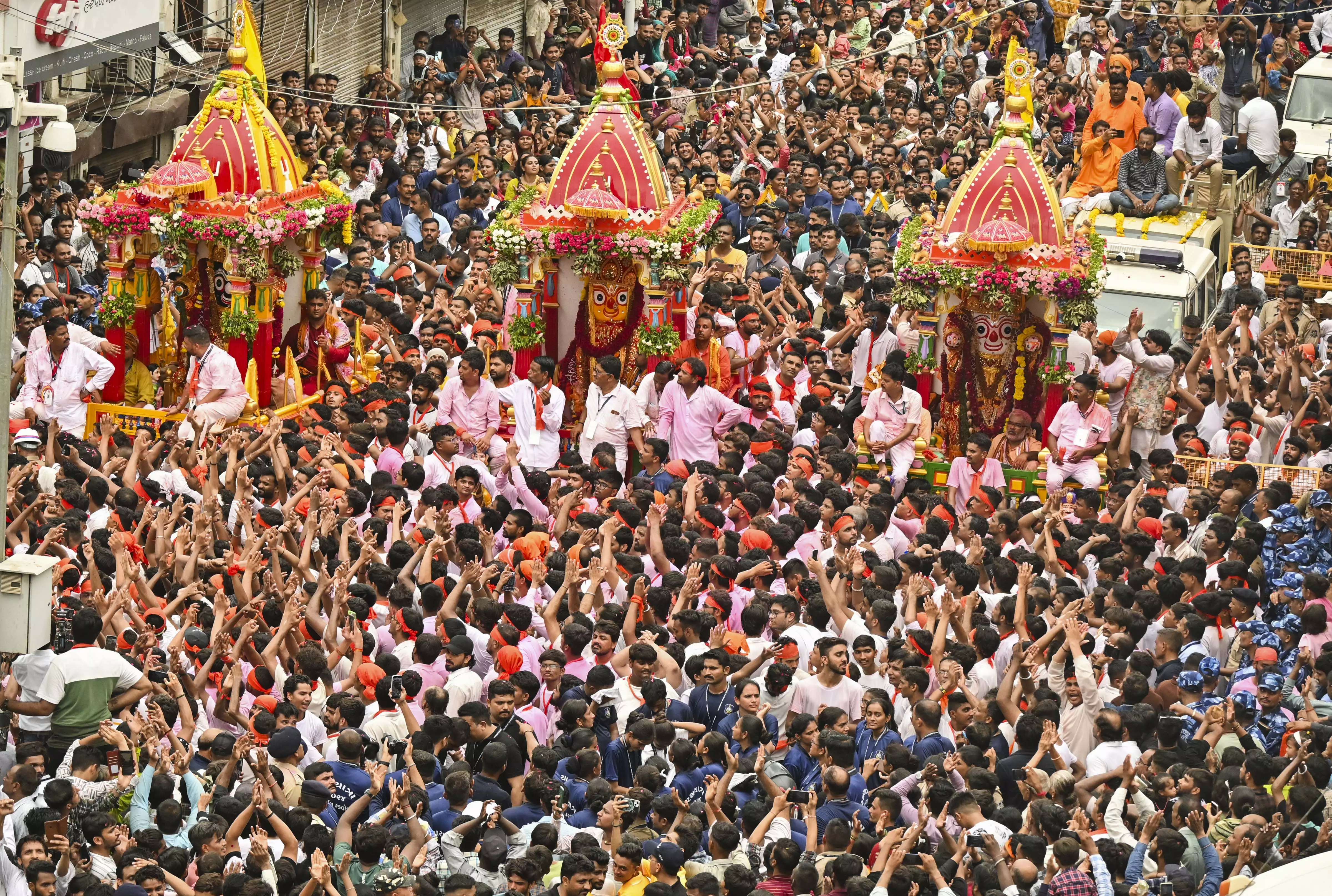 Devotees take part in the Rath Yatra in Ahmedabad | PTI 