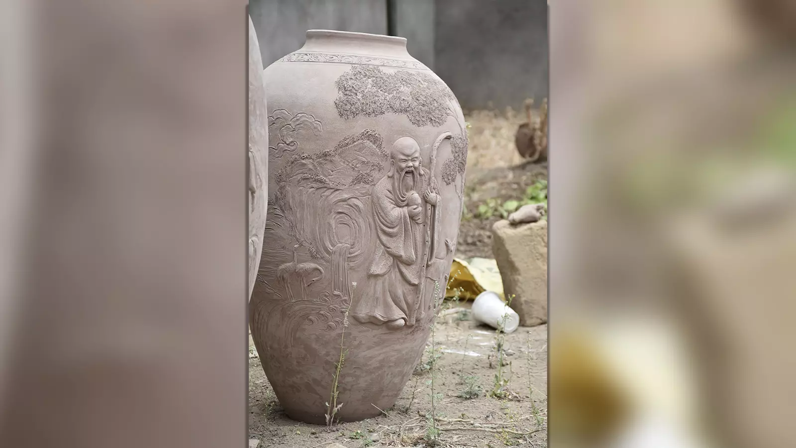 Buddhist art on pots.