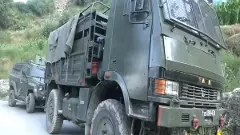 Army vehicles deployed at the site of the encounter. Photo: ANI/X