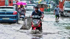 Early morning rains bring relief from heat for Delhi, but also cause traffic snarls