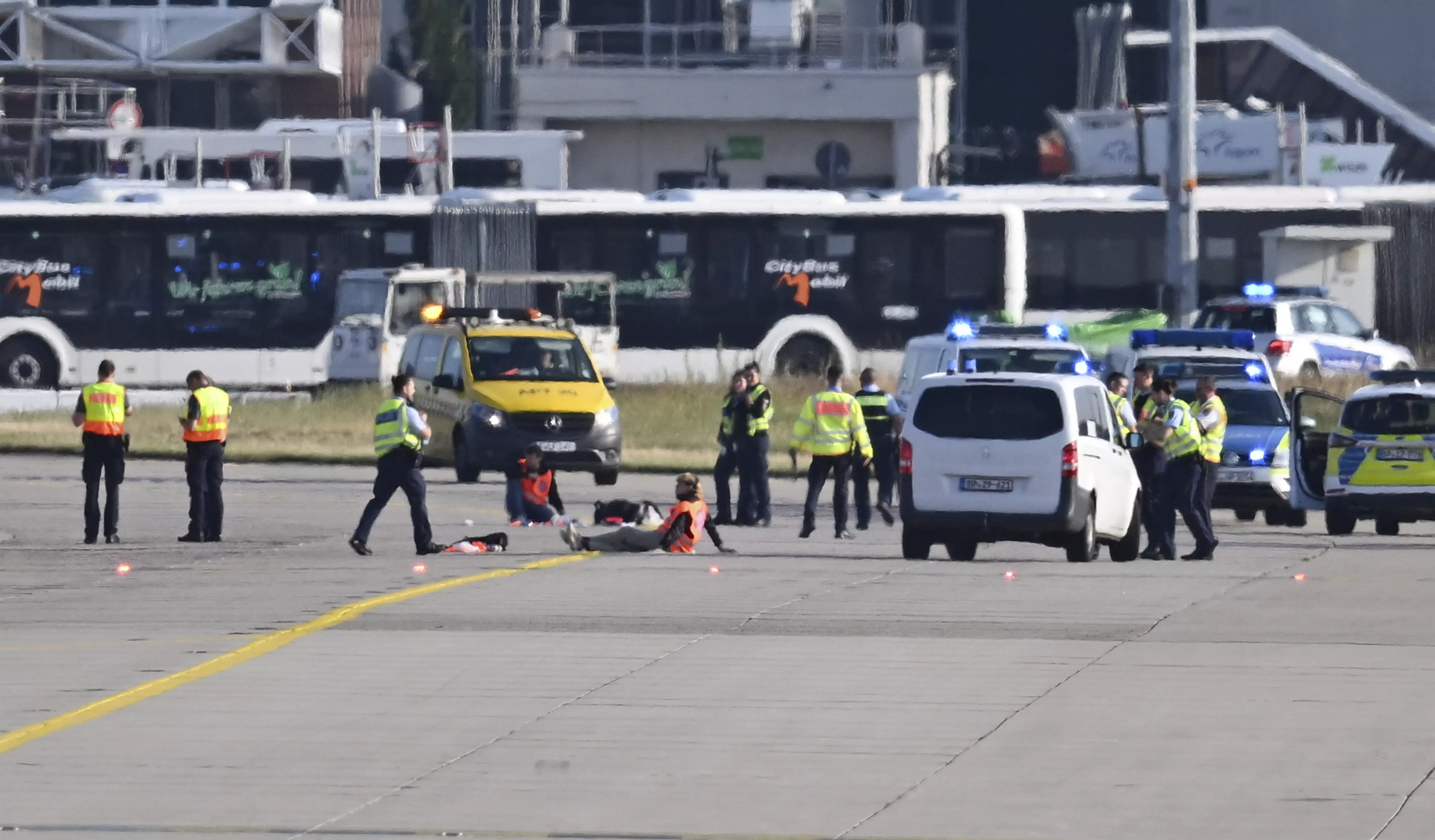 Frankfurt Airport: Over 100 flights cancelled as climate activists tape themselves to runway