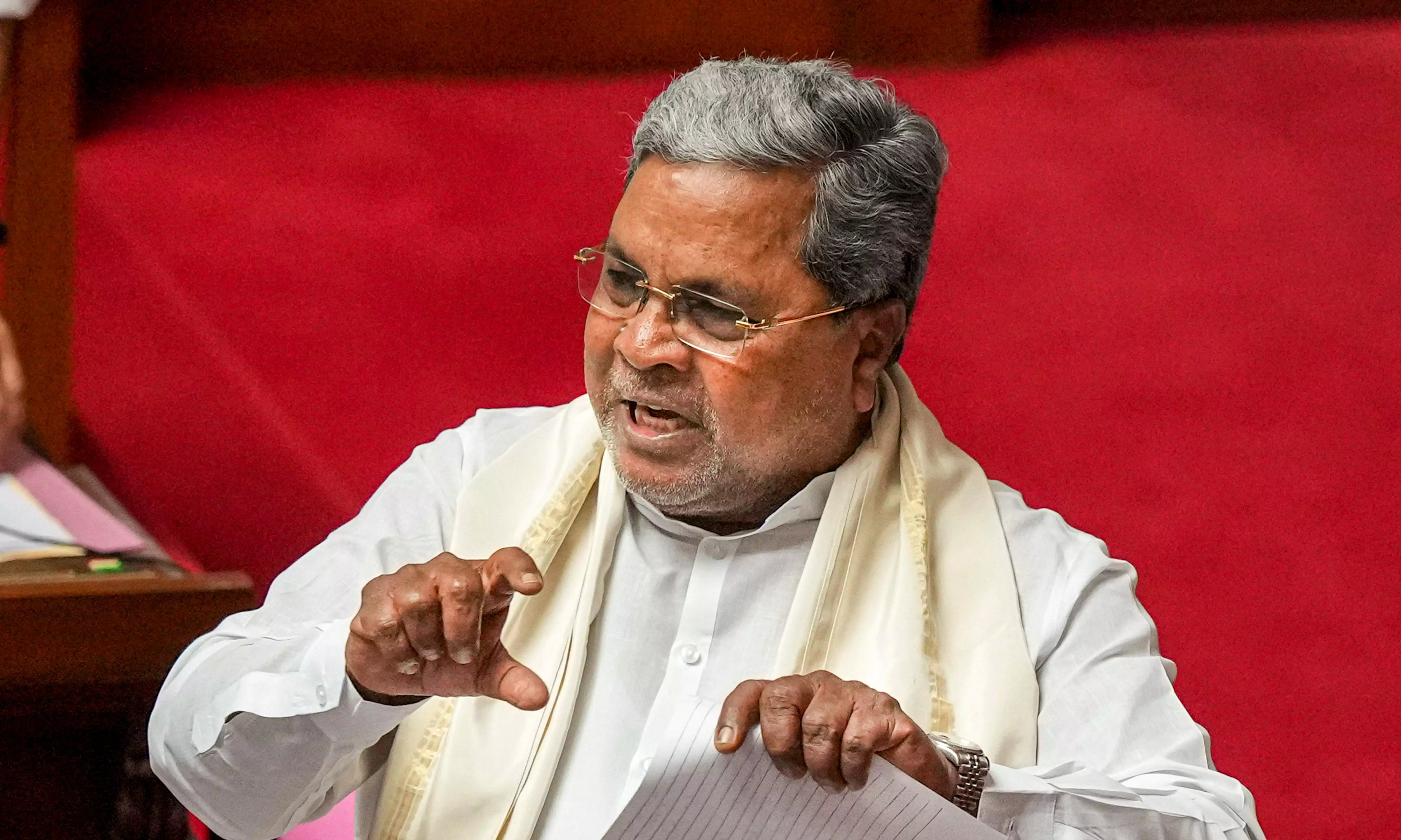 Bengaluru: Karnataka Chief Minister Siddaramaiah speaks during the Karnataka Legislative Council session at Vidhana Soudha, in Bengaluru, Thursday, July 25, 2024. (PTI Photo/Shailendra Bhojak) (PTI07_25_2024_000131B)