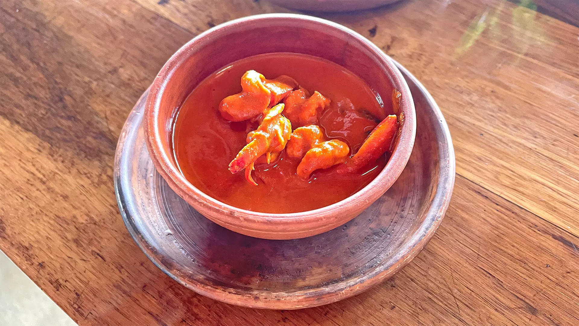 Ambotik Prawns, a piquant dish with a pronounced sourness, accented by local Sichuan peppercorns.