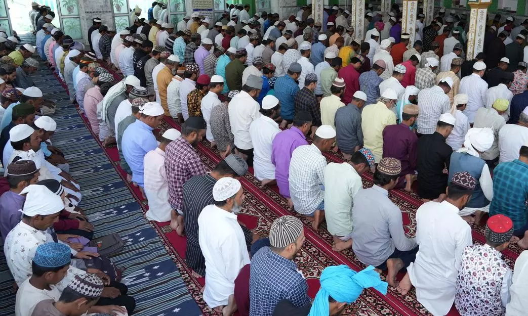 Indian Muslims offer Zuhr (afternoon) namaz at a mosque