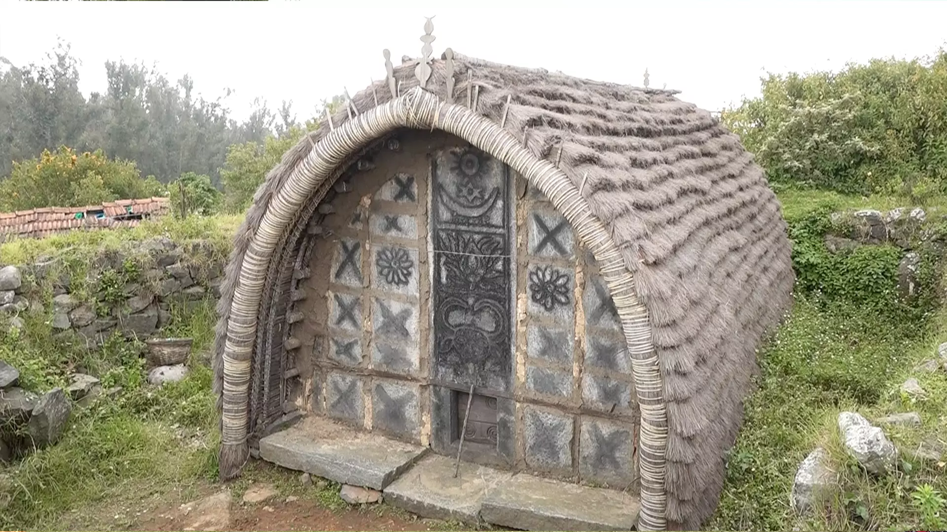 A Toda dairy temple. All the signs and symbols on the structure are related to buffaloes. 