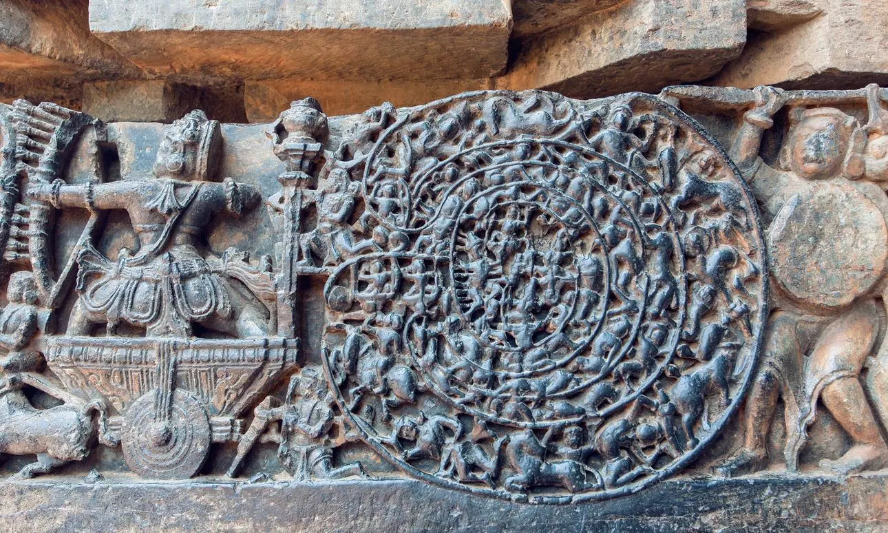 Hindu epic Mahabharata scene on carvings. Story of warrior Abhimanyu entering the Chakravyuha on stone artworks