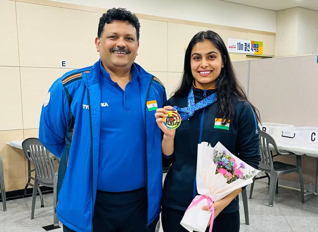 Manu Bhaker with national pistol coach Samaresh Jung