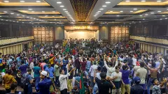 Day after Sheikh Hasina flees, uneasy calm in Bangladesh